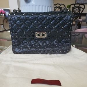 Valentino Garavani Chain Crossbody/handbag in Aged Calf skin leather.